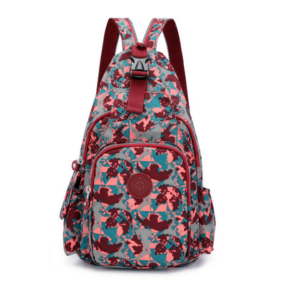 Naiste suur lillemotiivide ja tõmblukuga seljakott