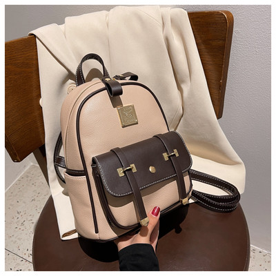 Neljas värvitoonis esitaskuga seljakott