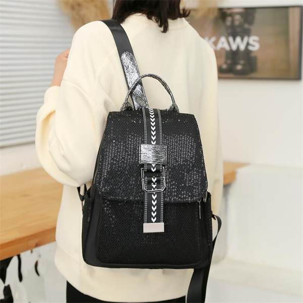 Naiste seljakott musta värvi ja tekstiilist rihmadega