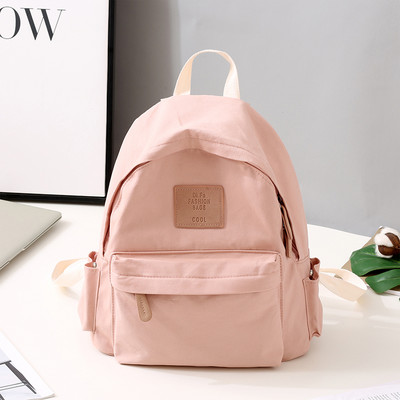 Funktsionaalne mitmes värvitoonis tekstiilist seljakott