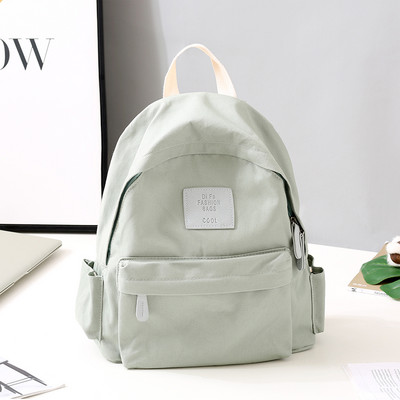 Funktsionaalne mitmes värvitoonis tekstiilist seljakott