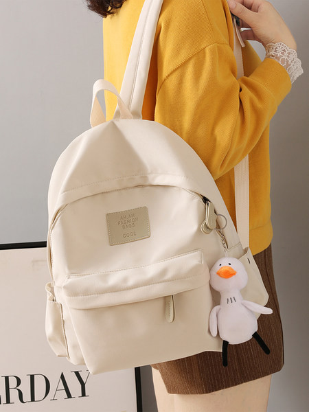 Funktsionaalne mitmes värvitoonis tekstiilist seljakott