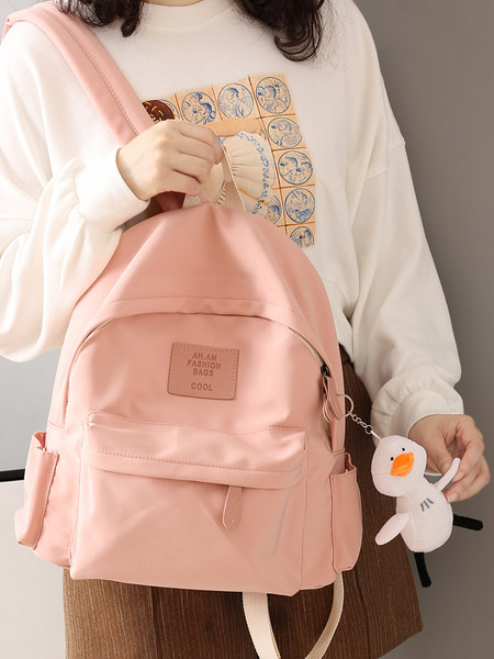 Funktsionaalne mitmes värvitoonis tekstiilist seljakott