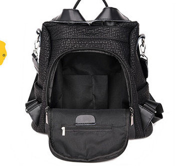 Naiste eko-nahast musta värvi metallidekooriga seljakott