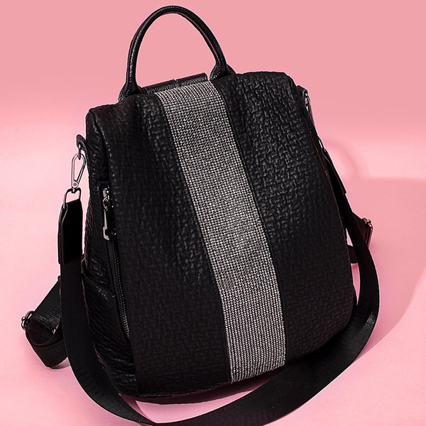 Naiste eko-nahast musta värvi metallidekooriga seljakott