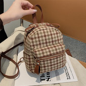 Stiilne naiste miniseljakott tekstiilist lukuga