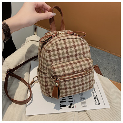 Stiilne naiste miniseljakott tekstiilist lukuga