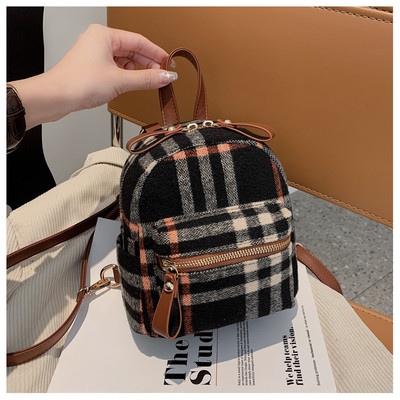 Stiilne naiste miniseljakott tekstiilist lukuga