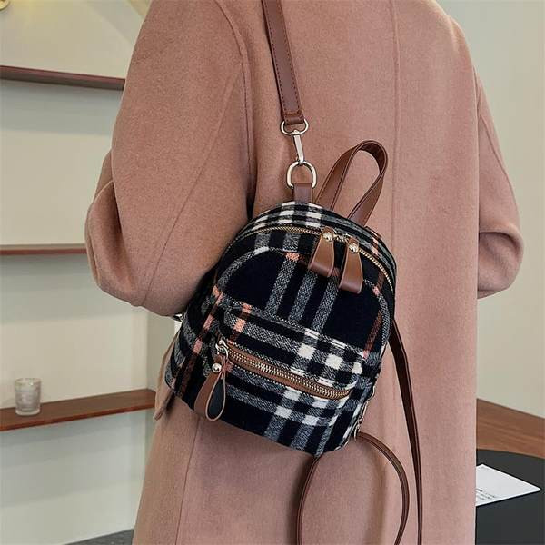 Stiilne naiste miniseljakott tekstiilist lukuga