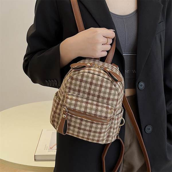 Stiilne naiste miniseljakott tekstiilist lukuga