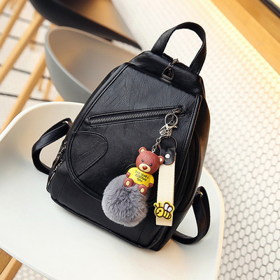 Naiste kunstnahast seljakott ja ripats udusulgedega