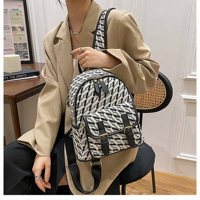 Női textil hátizsák csattal