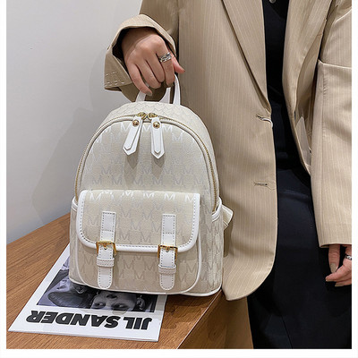 Női textil hátizsák csattal