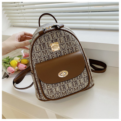 Eko-nahast ja tekstiilist ning ökonahast vabaaja seljakott naistele metallkinnitusega