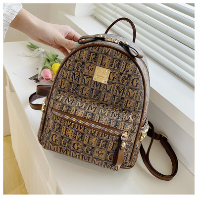 Eko-nahast ja tekstiilist ning ökonahast vabaaja seljakott naistele metallkinnitusega