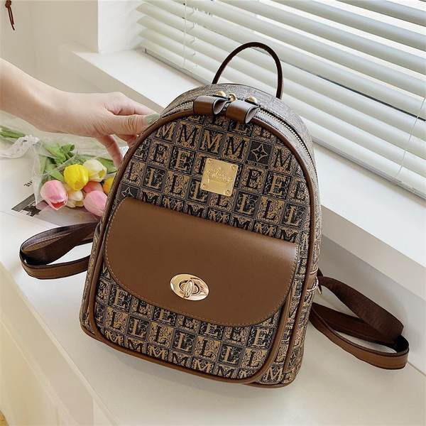 Eko-nahast ja tekstiilist ning ökonahast vabaaja seljakott naistele metallkinnitusega