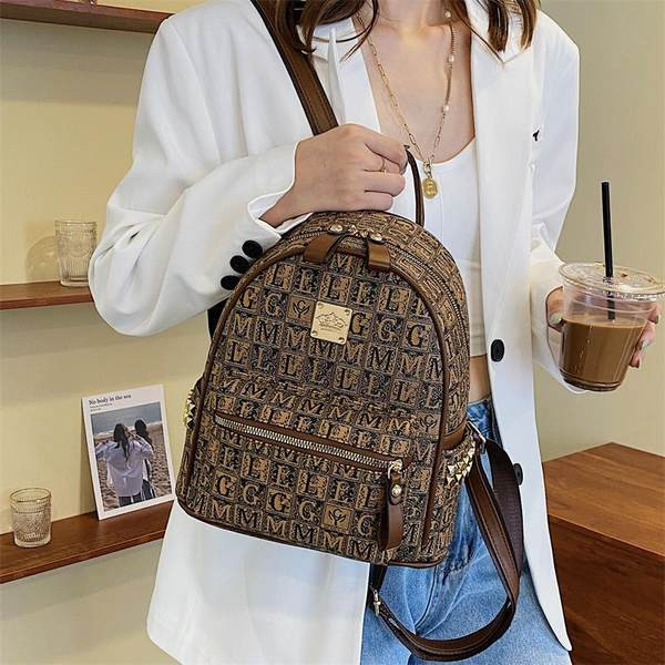 Eko-nahast ja tekstiilist ning ökonahast vabaaja seljakott naistele metallkinnitusega