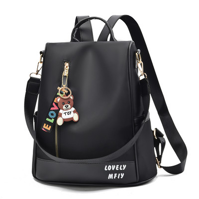 Naiste tekstiilist seljakott kirjaga plain model