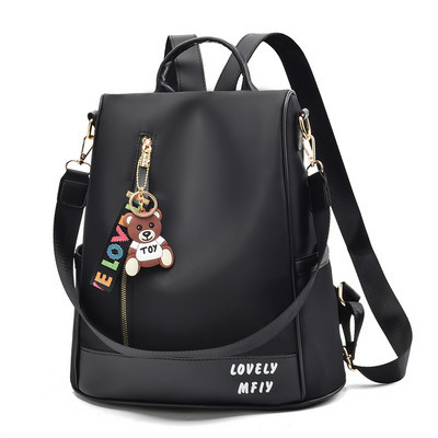 Naiste tekstiilist seljakott kirjaga plain model