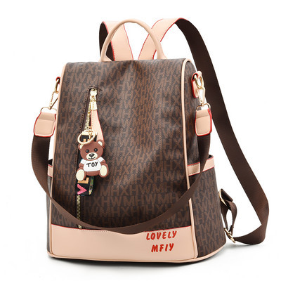 Naiste tekstiilist seljakott kirjaga plain model