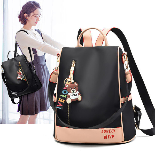 Naiste tekstiilist seljakott kirjaga plain model