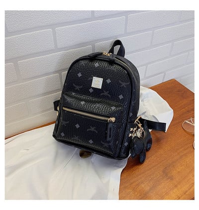 Stiilne naiste nahast miniseljakott aplikatsiooniga