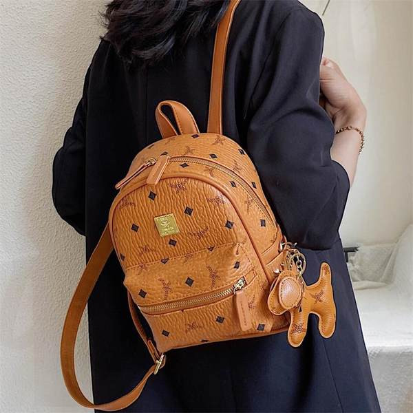 Stiilne naiste nahast miniseljakott aplikatsiooniga