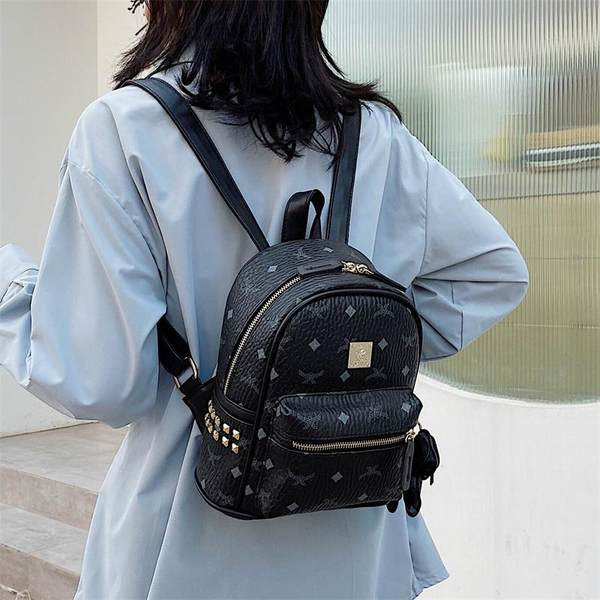 Stiilne naiste nahast miniseljakott aplikatsiooniga