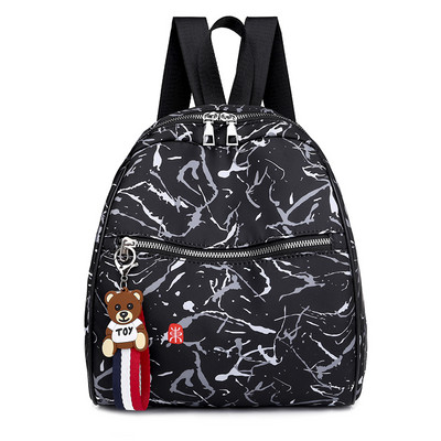 Naiste seljakott halli ja valge ripatsiga