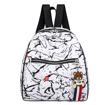 Naiste seljakott halli ja valge ripatsiga