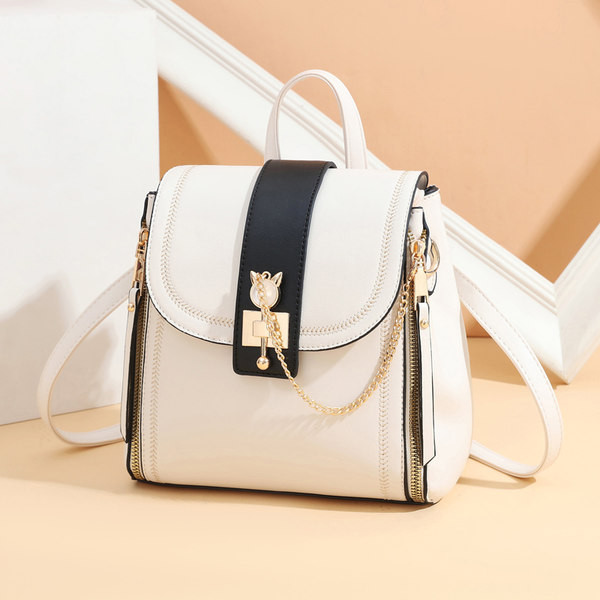 Naiste kandiline metallist kaunistusega seljakott