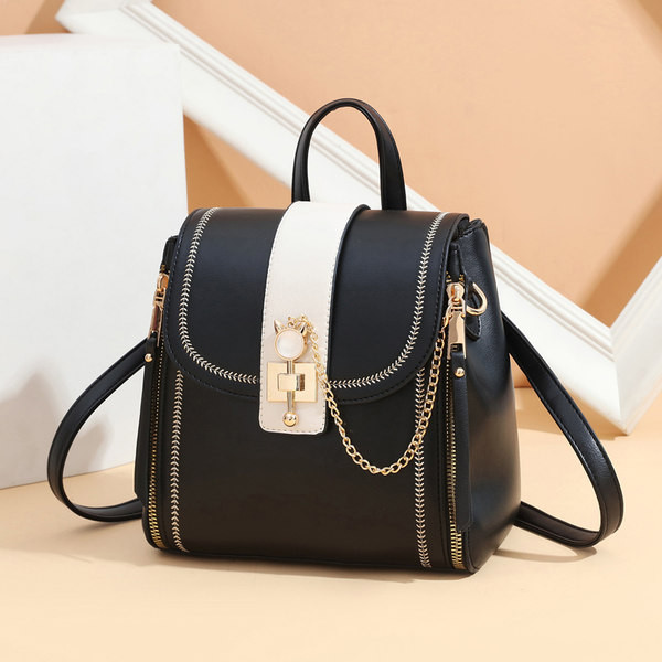 Naiste kandiline metallist kaunistusega seljakott