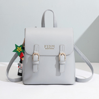 Naiste nahast seljakott mitmes värvitoonis kirjaga