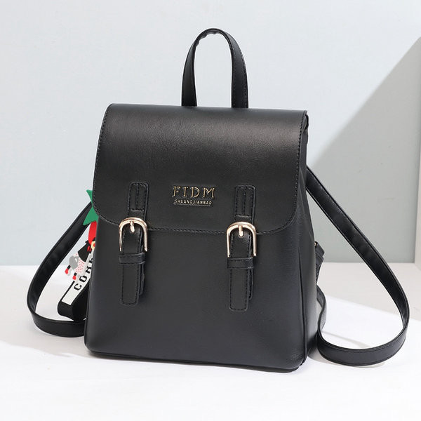 Naiste nahast seljakott mitmes värvitoonis kirjaga