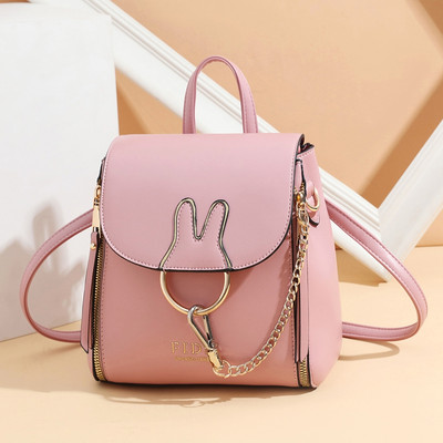 Γυναικείο καθημερινό σακίδιο πλάτης με μεταλλική διακόσμηση