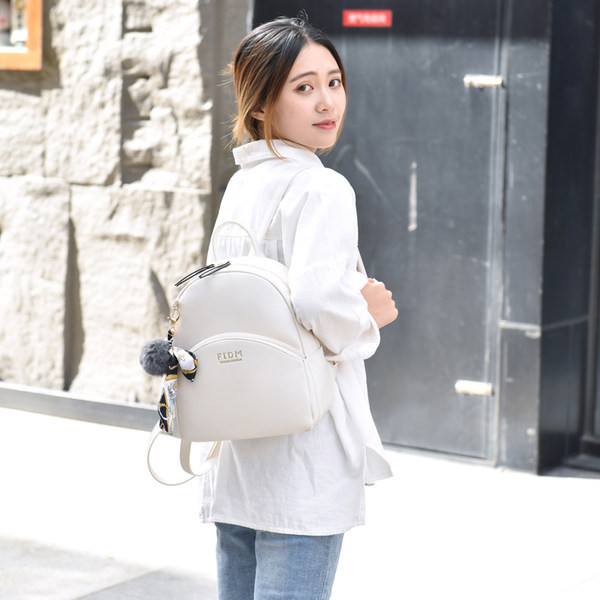 Naiste nahast seljakott taskuga kolmes värvitoonis