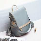 Moodne naiste seljakott lühikese ja pika tekstiilist käepidemega