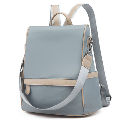 Moodne naiste seljakott lühikese ja pika tekstiilist käepidemega