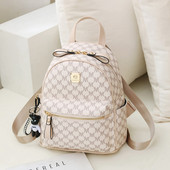 Naiste seljakott ökonahast ripatsi ja metallist kaunistusega