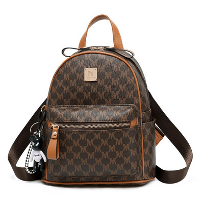 Naiste seljakott ökonahast ripatsi ja metallist kaunistusega