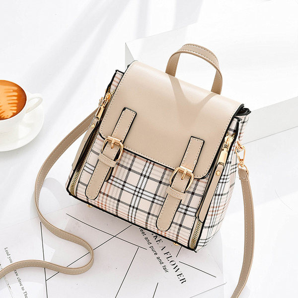 Moodne ruuduruuduline pandlaga seljakott erinevates mudelites