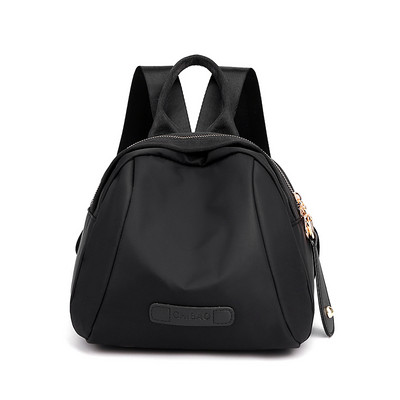 Naiste tekstiilist seljakott ja lühike käepide