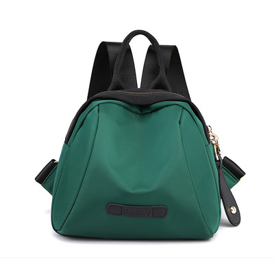 Naiste tekstiilist seljakott ja lühike käepide