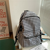 Naiste ruuduline seljakott esitaskuga