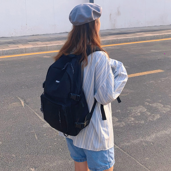 Naiste spordiseljakott musta värvi