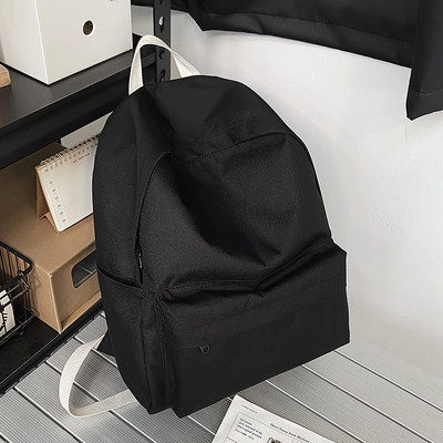 Naiste kooli seljakott tekstiilist lihtsast mudelist