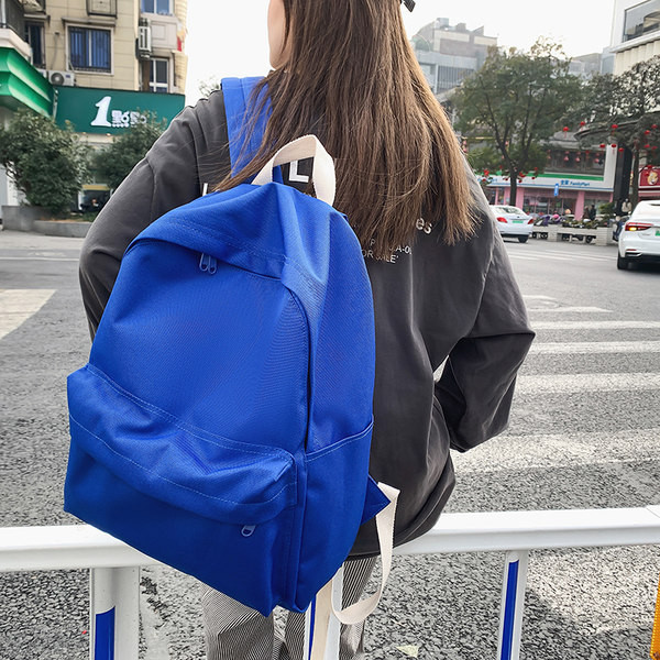 Naiste kooli seljakott tekstiilist lihtsast mudelist