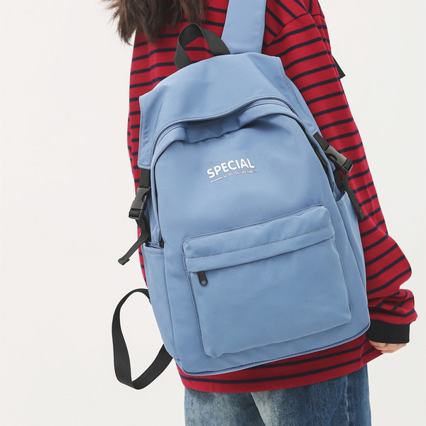 Modern női hátizsák felirattal és cipzárral