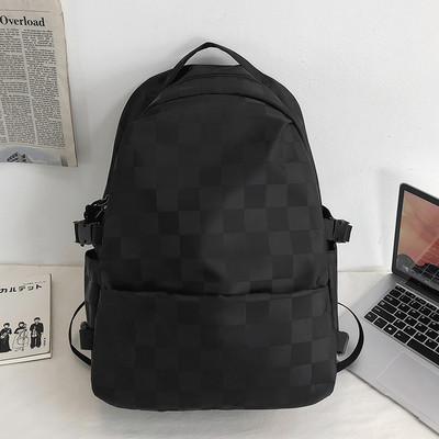 Női kockás hátizsák és cipzár