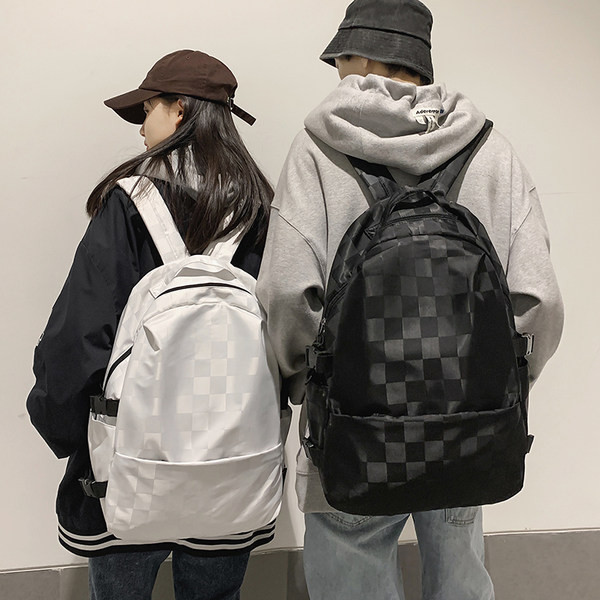 Női kockás hátizsák és cipzár